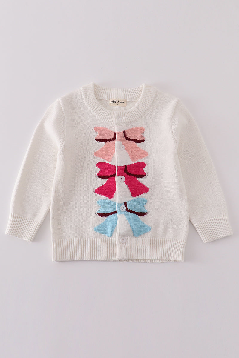 Girls’ White Knit Cardigan with Colorful Bow Design
