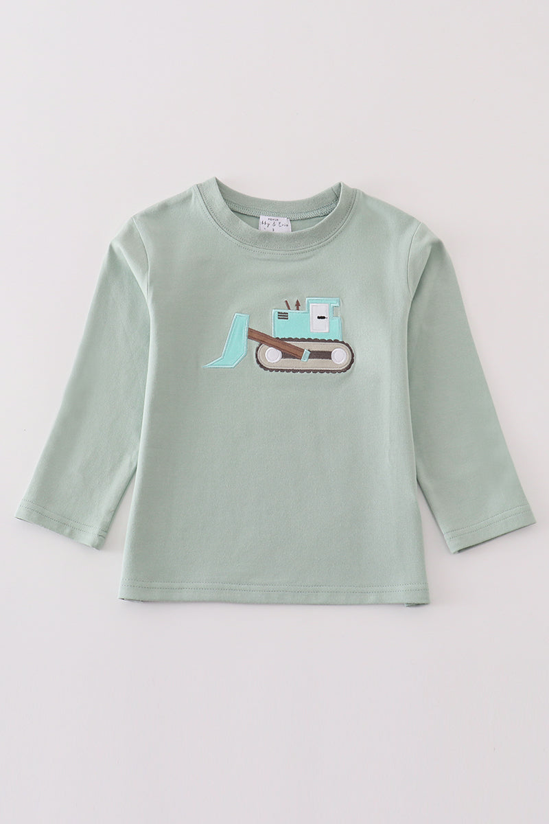 front light sage green long sleeve top with teal excavator applique on it
