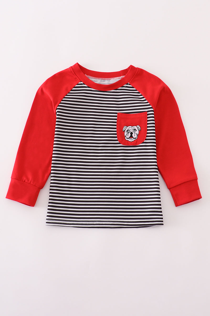 Children's long-sleeve shirt with red sleeves and black and white striped body on a light beige background