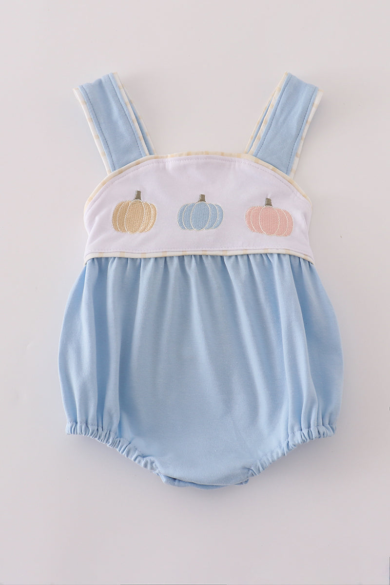 Light blue baby romper with embroidered pumpkins on a white background