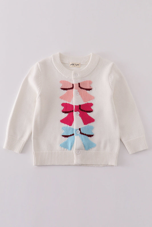 Girls’ White Knit Cardigan with Colorful Bow Design


