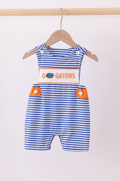 Blue and white striped romper with 'GO GATORS' text on a wooden hanger against a white background