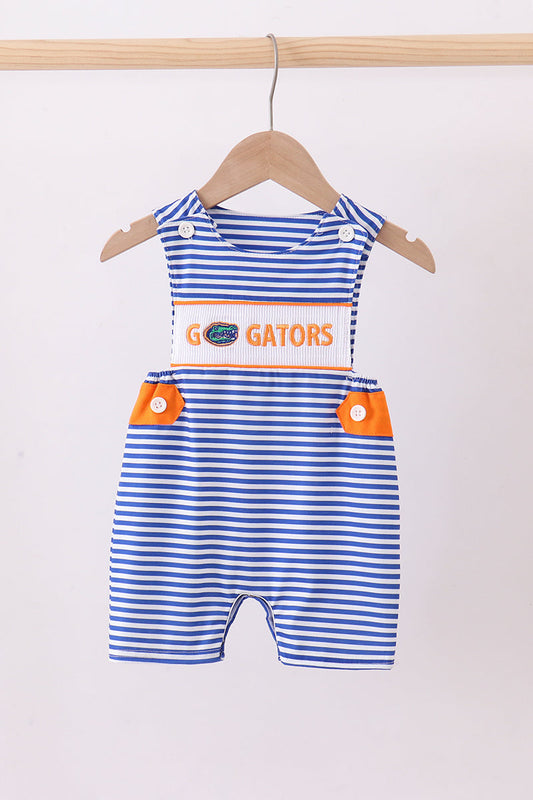 Blue and white striped romper with 'GO GATORS' text on a wooden hanger against a white background