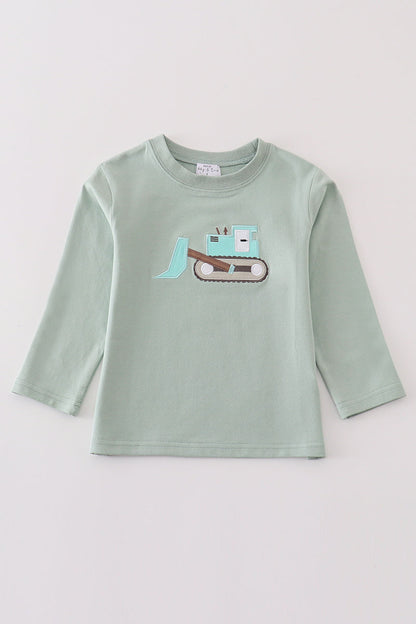 front light sage green long sleeve top with teal excavator applique on it