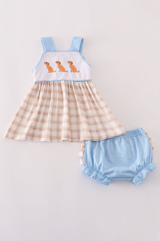 Children's dress with plaid skirt and blue top, paired with matching bloomers on a light gray background.