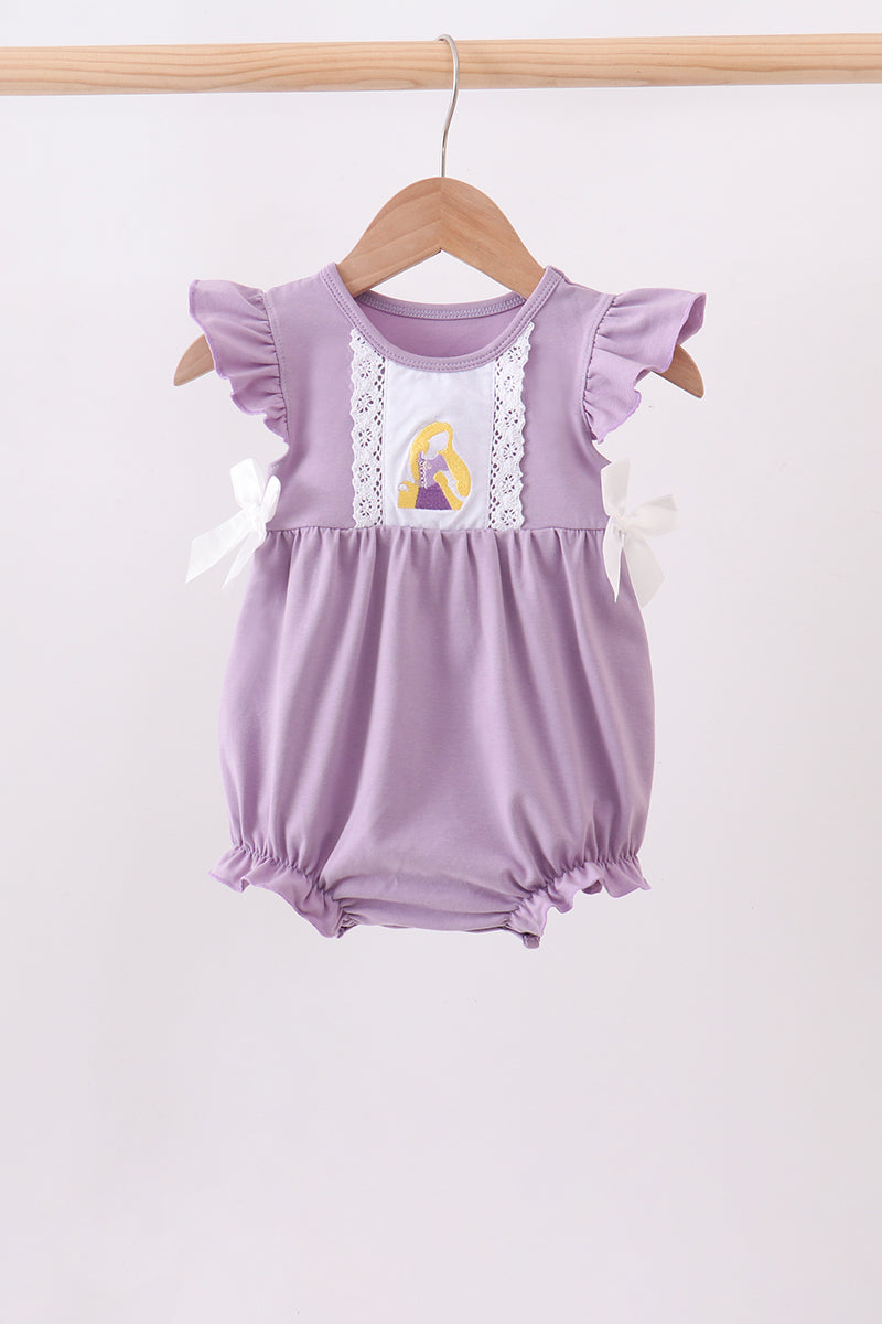 A baby girl's lavender purple romper with ruffled sleeves, white lace trim, white bow details, and a graphic of Rapunzel on the chest, hanging on a wooden hanger.