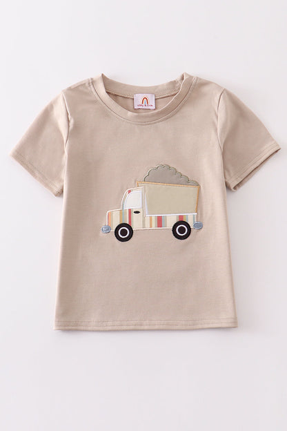 Beige dump truck 