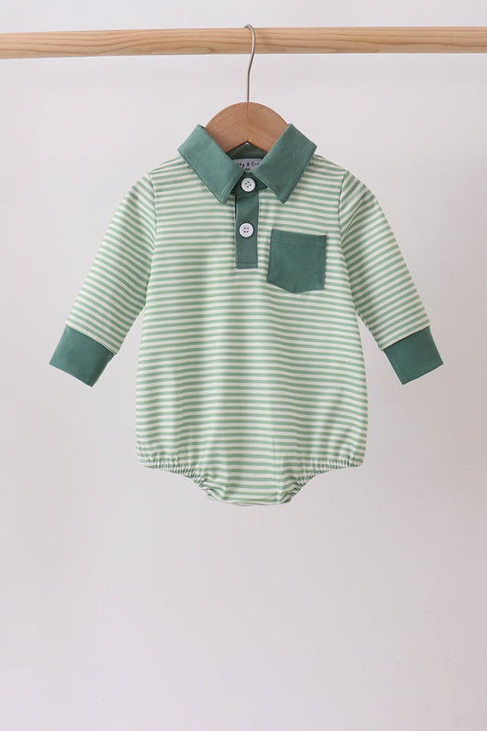 A baby long-sleeve romper with light green and white horizontal stripes, featuring a solid green collar, button placket, chest pocket, and green cuffs, hanging on a wooden hanger.