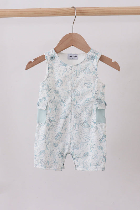 Baby romper with a floral pattern on a wooden hanger against a light background