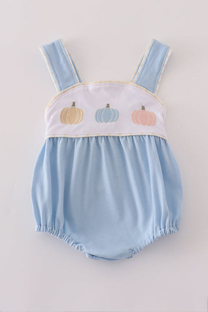 Light blue baby romper with embroidered pumpkins on a white background